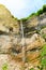 The Kinchkha waterfall in the canyon of the river Okatse. Rest in Georgia. High waterfall in the Imereti region. Rocky ledges of