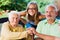 Kind Family Visiting Elderly Lady