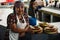 Kind lady selling local flat bread at the farmers market