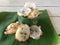 Kind of thai sweetmeat Thai desserts in banana leaf.