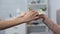Kind woman putting euro banknote in mature female hand, charity fund, donation