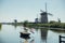 Kinderdijk mills, Netherlands - August, 2019 Summer scene in the famous Kinderdijk canal with windmills. Old Dutch village