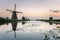Kinderdijk Windmills at Dusk and Reflection in Water