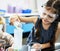 Kindergarten Students Mixing Solution in Science Experiment Laboratory Class