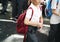 Kindergarten students walking crossing school road