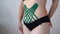 Kinesiology taping. kinesiology tape to patient belly.Anti-cellulite procedure for slim tummy. cellulite removal, sport