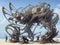 Kinetic sculpture propelled by wind on beach, Generative AI Illustration