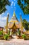 King Bumibhol stands in front of the white Chedi at Wat Chang Yuen,Thailand, Chiang Mai