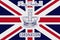 King Charles III Coronation text. Edwards crown. British flag background