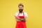 King of kitchen. Cook with beard and mustache yellow background. Royal recipe. Man mature cook wear cooking apron and