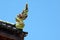 King of Nagas statue on blue sky