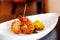 King Prawn Tikka with a saffron rice cake