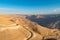 King`s Highway serpentines in Wadi al-Mujib gorge in sunset, Jordan, Middle East, Asia