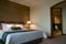 King size bed and bathroom of a five star suite