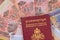 Kingdom of Cambodia Passport over Cambodian different nominal national currency Riels a banknotes