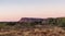 Kings Canyon cliff at sunset time. Panorama picture. Blue and pink sky. Watarrka national park, Northern Territory NT, Australia