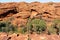 Kings canyon landscape with red sandstone domes and staircases pathway during the Rim walk in outback Australia