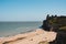 Kingsgate Castle on the top of the cliffs at the Kingsgate beach on sunny day