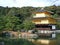 Kinkakuji Temple in Kyoto, Japan. Famous Golden pavilion with trees