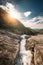 Kinsarvik, Hordaland, Norway. Water Stream Through Rocks In Hardangervidda Mountain Plateau. Sun Sunshine Above Rocky