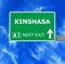 KINSHASA road sign against clear blue sky