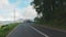 Kintamani, Bali, Indonesia - December 10 , 2021: Pov of a person driving along winding mountain road with wonderful view