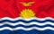 Kiribati country flag on wavy silk fabric background panorama