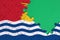 Kiribati flag is depicted on a completed jigsaw puzzle with free green copy space on the right side