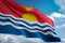 Kiribati national flag waving blue sky background realistic 3d illustration