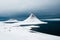 Kirkjufell, Church Mountain, Iceland\\\'s SnÃ¦fellsnes Peninsula covered by snow during winter,a mountain rising above the sea