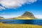 Kirkjufell, kirkjufellsfoss and atlantic ocean iceland in summer august