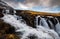 Kirkjufell mountain and the kirkjufellfoss waterfall in Iceland