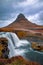 Kirkjufell mountain and Kirkjufellfoss waterfall, Snaefellsnes peninsula, Iceland. Long exposure shot in autumn