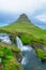 Kirkjufell mountain , and the Kirkjufellsfoss waterfalls