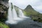 Kirkjufell mountain , and the Kirkjufellsfoss waterfalls