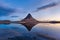 Kirkjufell and reflection in beautiful sunrise, Iceland