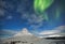 Kirkjufell with snow and aurora