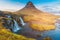 Kirkjufell volcano with waterfall