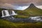 Kirkjufellfoss and Kirkjufell mountain in cloudy day ,Iceland.