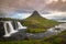 Kirkjufellfoss and Kirkjufell mountain in cloudy day ,Iceland.