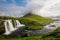 Kirkjufellfoss and Kirkjufell mountain in cloudy day ,Iceland