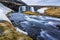 Kirkjufellsfoss, waterfalls at Kirkjufell, surrounded by melting