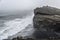 Kirkjufjara beach cliff and waves