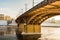 Kirov`s bridge of arch construction Belarus, view from below to the bank of the river in winter time