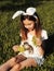 Kis with little rabbit. Easter symbol. Friendship between child and animal.