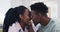 Kiss, forehead or happy black couple in home living room bonding together to relax with support or trust. Speaking, love