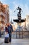 Kiss by the fountain of Neptune - Gdansk, Poland