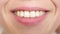Kiss lips Close-up. beautiful smile of a young woman. girl smiling teeth and lips close-up.