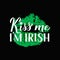 Kiss me I m Irish calligraphy hand lettering with lips print. Funny St. Patricks day quote with green lipstick kiss. Vector