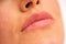 Kissable lips of a woman in close up